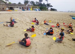 Petit cours de pagaies sur la plage